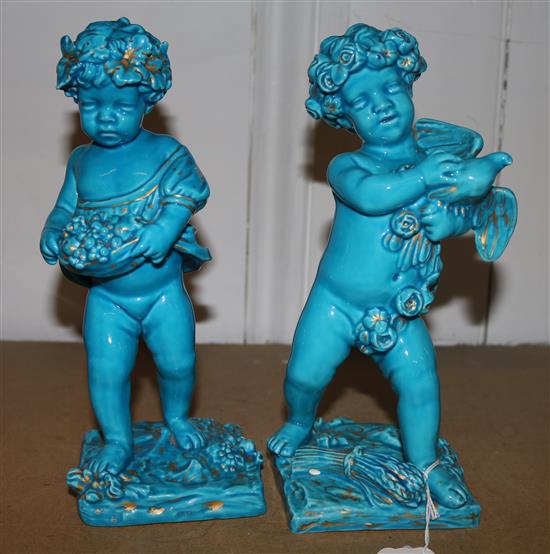 Pair turquoise cherub figures